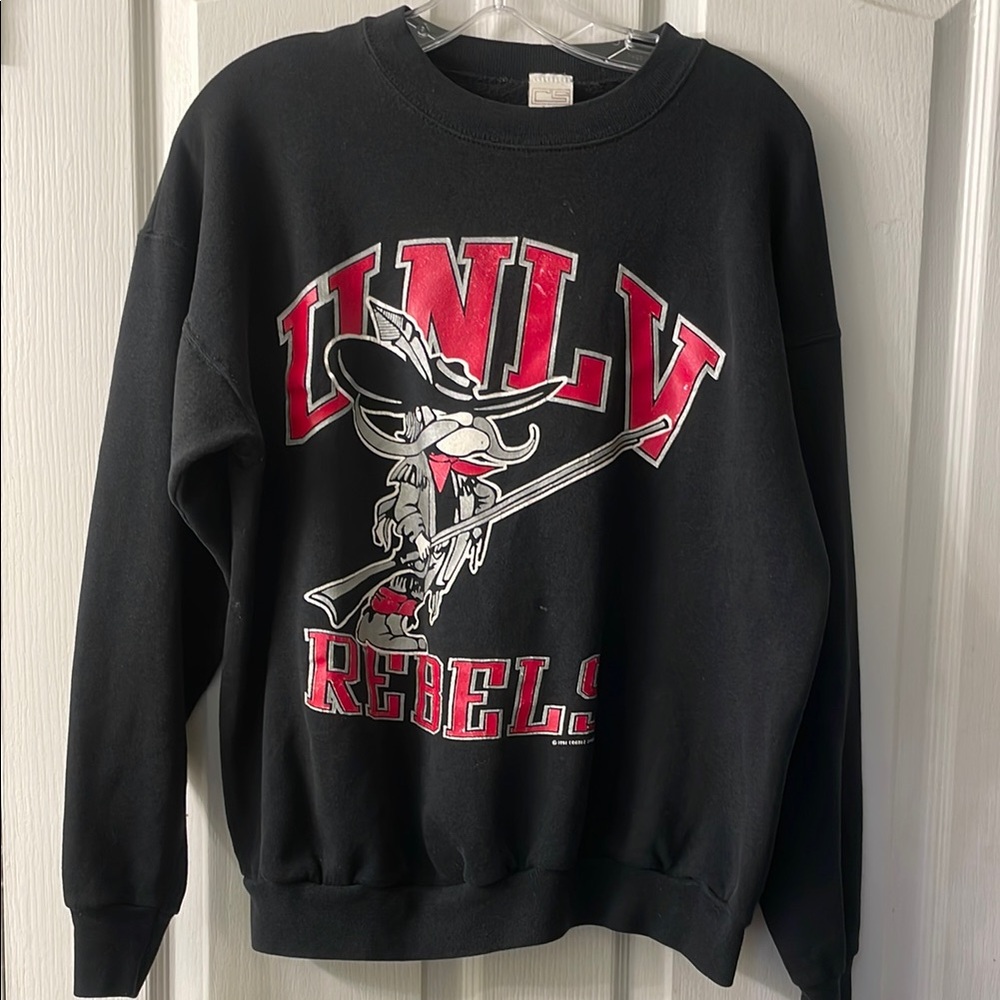 Vintage 1991 UNLV Rebels Black Crewneck Sweater with Bold Graphic Design size XL